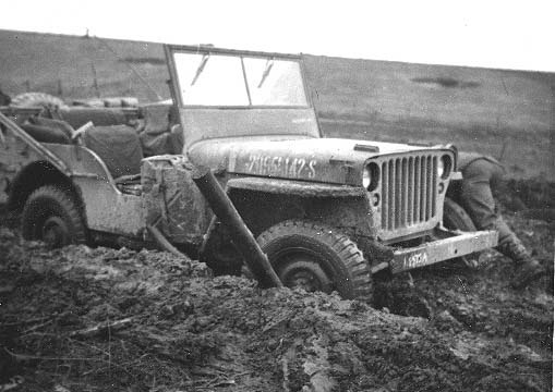 Jeep stuck in the mud near Wilwerdange, Germany February 1945.