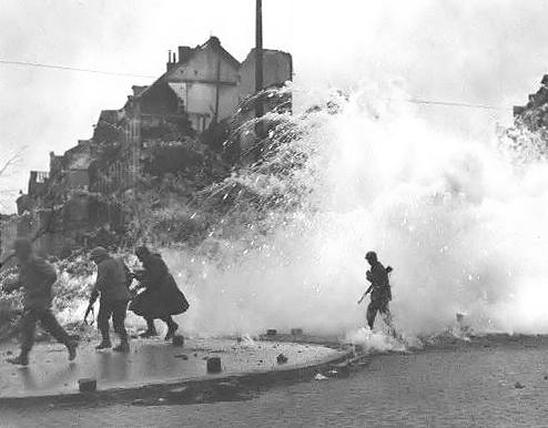 Spearhead soldiers close to an explosion in Cologne Germany.