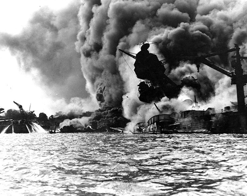 USS Arizona burning